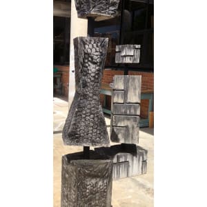 The Texture Within Me by Nadia Meadows  Image: The next pillar is a salute to being a woman sculpture. This consists of a repetitive pattern that is smooth and silky to the touch but is more sharp cornered and cinched at the waist. As a female sculptor, I like to build and make huge invasive things but I also love to dress and be fashionable.