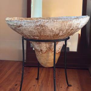 Vessel for Ambrosia by Jennifer K Brown  Image: Elevated on a wrought iron stand, height = 24"