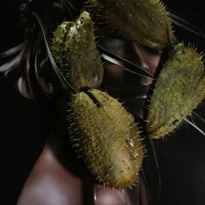 Woman with chayote by Alex Guerra