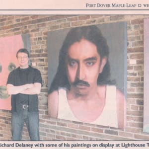Fugitive Hector Fenwick-Goodman by Richard Michael Delaney  Image: Port Dover Maple Leaf photo of the artist with paintings installed for a 2010, solo show, at Port Dover's Lighthouse Festival Theatre Gallery. 