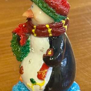 Penguin with Wreath by David  H. L. Blackman, Ph. D. 