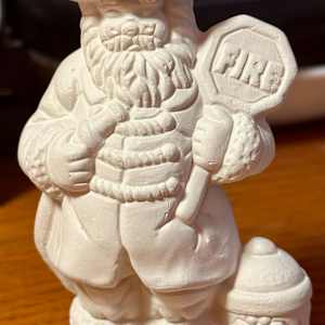 Fire Santa by David  H. L. Blackman, Ph. D.  Image: Fire Santa - Greenware