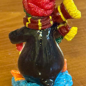 Penguin with Wreath by David  H. L. Blackman, Ph. D. 