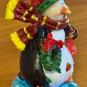 Penguin with Wreath by David  H. L. Blackman, Ph. D. 