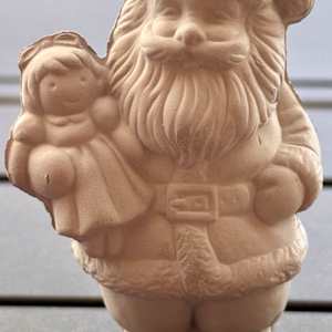 Santa with Dolly by David  H. L. Blackman, Ph. D.  Image: Greenware