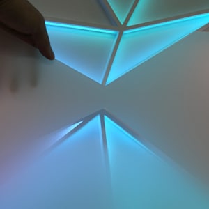 Ball Hitting Mirror by James Clar 