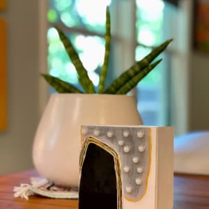 Loyal by Anne Burtt  Image: Loyal on Table - Side