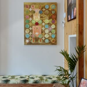 Fiji/Te Whiti by Dr  Rangihiroa Panoho  Image: Fiji\ Whiti 'The Crossover', acrylic and gold acrylic on board, 2014 alongside a portrait of Hekenukumai Busby, ĀTĀROA exhibition inside Whetū Mārama whare wānanga Kupe Waka Centre, 10 December 2022 - December 2024. Fiji examines the crossover from Fiji and asks the question, 'at what point did our tūpuna develop a consciousness of their identity as a Polynesian people? My uncle Hekenukumai Busby explored this question in his organising and sailing waka haorua across the Pacific ocean. Hekenukumai spoke frequently about Kupe and his retracing his steps back to Hawaiki 'our Polynesian homelands'. Another focus Hekenukumai repeatedly drew on was celestial navigation. The painting features a number of references to stars and birds that helped guide our ancestors to far flung islands aaround the South Pacific. These migrations also brought motifs from Island Asia and Lapita culture into distant Oceania. Some of these motifs, like the three fingered hand and the frigate are celebrated in this work.  