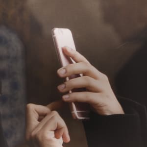 Covered Woman with iPhone, Istanbul by Helen Donis-Keller  Image: Close up