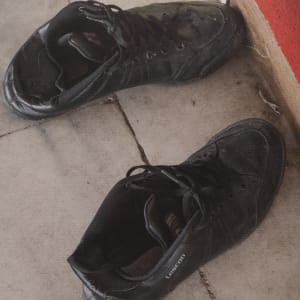 Man's Shoes Outside A Mosque, Istanbul by Helen Donis-Keller  Image: Close up