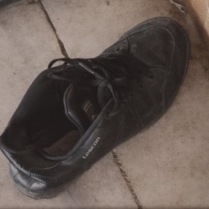 Man's Shoes Outside A Mosque, Istanbul by Helen Donis-Keller  Image: Close up