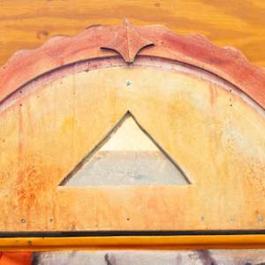 Peace Shrine Triptych | Shrine Arch Roof Gorgon by Rumi Tsuda  Image: Shrine Arch Roof | 23.75"H X 50.5"W X 3"D; Acrylic, Fabric Dye, Wood, Mirror, Aluminum Angle. #1025