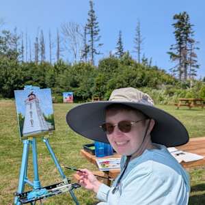 Cape Bear Lighthouse en plein air 2 by Rebeka Darylin  Image: Painting on site at Cape Bear Lighthouse and Marconi Station, PE