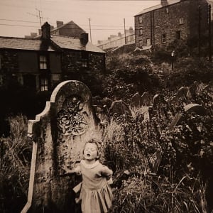 Girl Singing in a Graveyard, Wales by Bruce Davidson