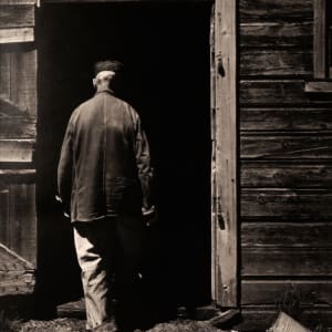 Uncle Henry Entering Barn, 1947 by Wright Morris