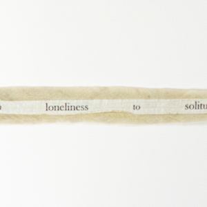 From Loneliness to Solitude by Molly Coy ARTIST  .  Alan Coy PHOTOGRAPHER  Image: Two handmade Artist Books joined by a leather and silk band.