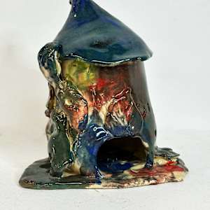 The Enchanted Clay Cottage by Nico