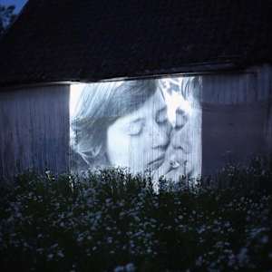 Sommaren med Monika (Summer with Monika) screening on a side of a barn in Iowa, USA by Ingmar Bergman