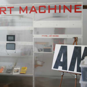 Art Machine (Artists Meeting) by G.H. Hovagimyan  Image: Font view of  AMAM with sign