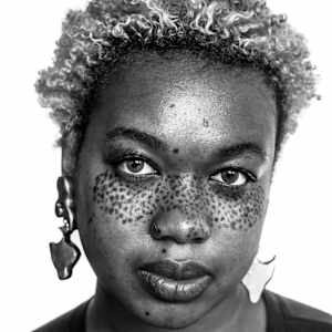 Freckled Gaze by Abigail Ekue