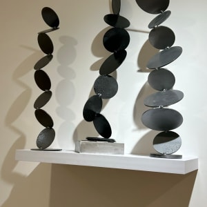 Black bubble totem installation by Vivien  Abrams Collens