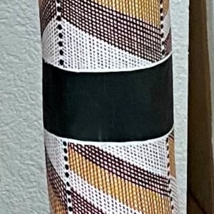 Poteau cérémoniel by Annie Wurrkidj