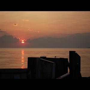 University of Toledo/Gillham Hall Purchases by Bonnie Dolin, John & Marcia Koverman, Dana Oldfather, Jan Bell, Edward Casagrande, Beth Himsworth, Katherine Ignatenko, Melinda Rosenberg, Michael Sheets, Sai Sinbondit, Becky Linhardt  Image: Becky Linhardt, Cincinnati, OH 
"Lake Erie Sunset", Photography, 16" x 30" $500