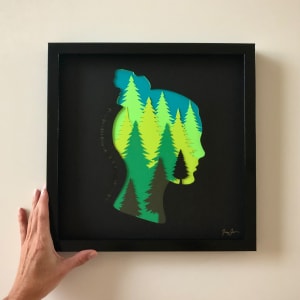 Into The Forest by Jessey Jansen  Image: Signed original art made from layers of hand and machine cut paper, meticulously designed and arranged inside 12x12in black wood shadowbox frame