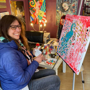 Bird in paradise by Annabelle Volpi  Image: Me painting in the art gallery 