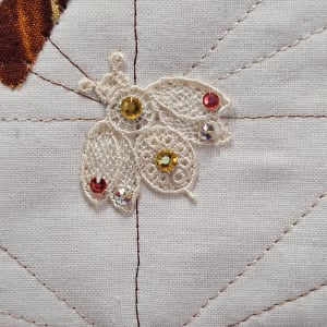 Choose Joy by Jeanette Floyd  Image: Detail image. The bumble bee  has sawarvski crystals.