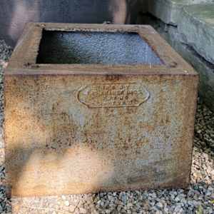Kramer Bros. Iron Urn on Plinth by Kramer Brothers Company 