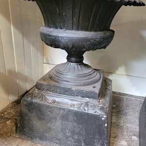 Kramer Bros. Black Iron Urns on Base / Pair by Kramer Brothers Company 