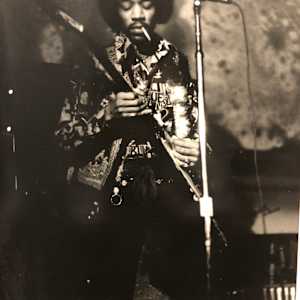 Jimi Hendrix Smoking and Playing by Grant Jacobs