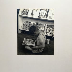 "Child Reading Comics" by Margaret Daughtry 