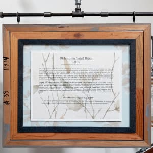 04. Structural Damage by Shelby Head  Image: Back of frame: Oklahoma Land Rush 1889, 13”x 18”