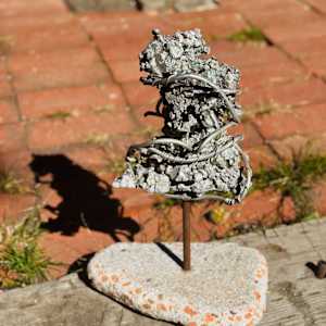 Molten Man, found in sand, on stolen land. by Ryan Hackbarth