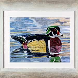 Wood Duck on Water by Janet Herman  Image: As framed in Farmhouse wood frame, neutral stain. Double matting is "white wash" neutral. 