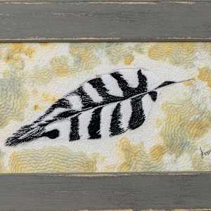 Woodpecker Feather by Janet Herman  Image: As framed