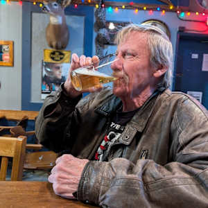Brian by Hanna Bordewijk  Image: Original photo I took of Brian in the bar. (2024)
